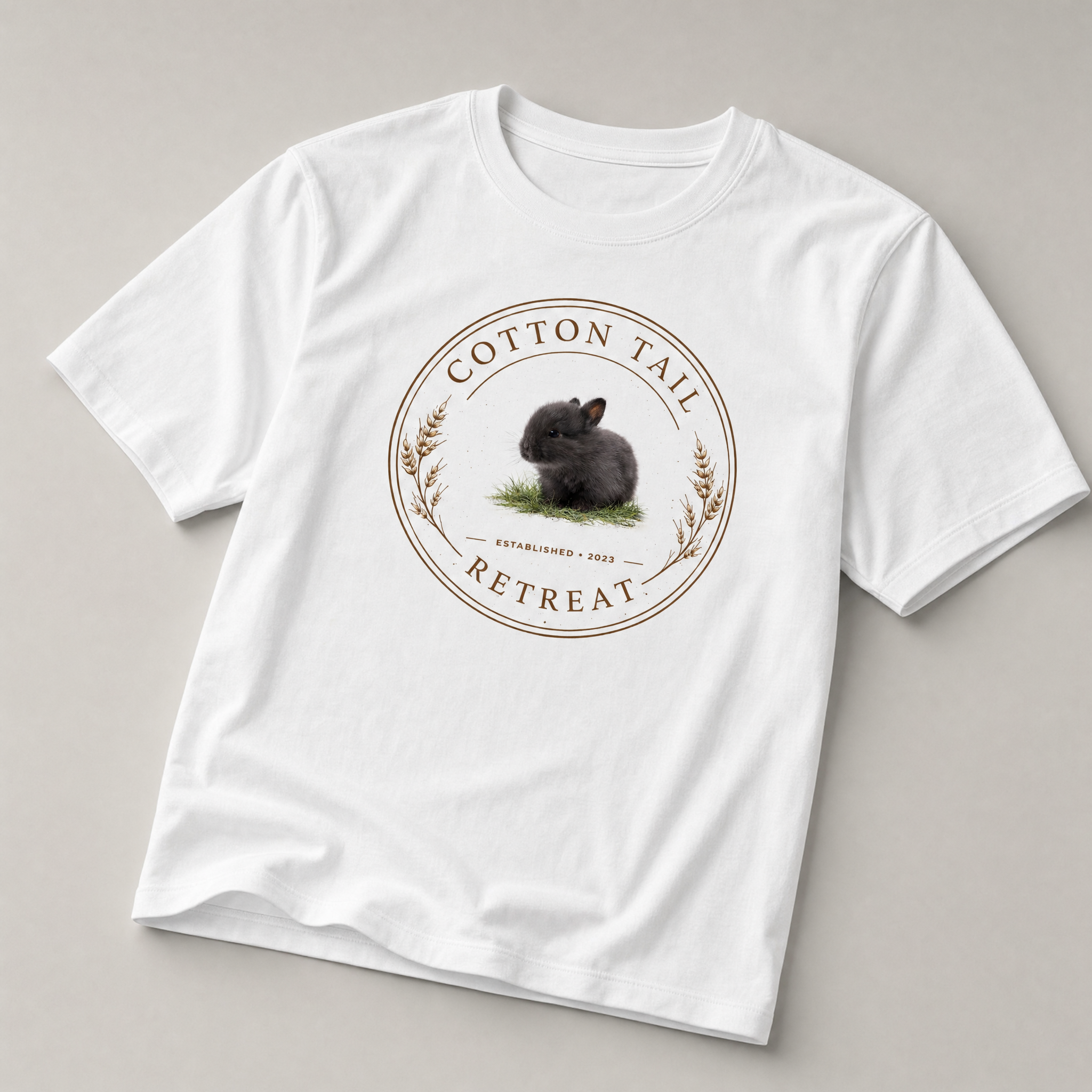 Cotton Tail Retreat logo tee in White — studio product shot